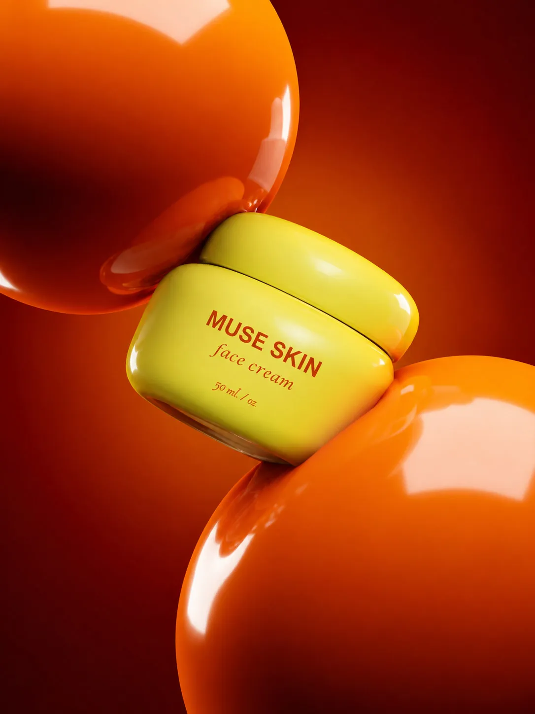 La crema MUSE SKIN entre esferas naranjas